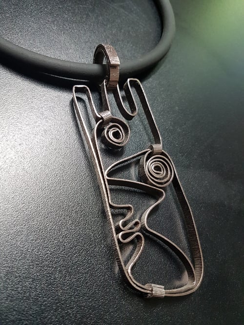 Image of face pendant #3