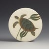 Green turtle carved wall hanging