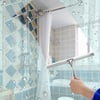 Bathroom mirror wiper