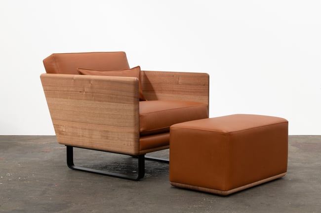  CLOVER LOUNGE OTTOMAN IN TASMANIAN OAK WITH TOBACCO LEATHER