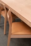 ROSE DINING CHAIR IN TASMANIAN OAK WITH AN UPHOLSTERED TAN LEATHER SEAT