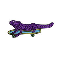 Image 1 of PURPLE LIZARD SKATER PIN