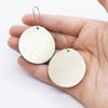 leather metallic disc or hoop earrings