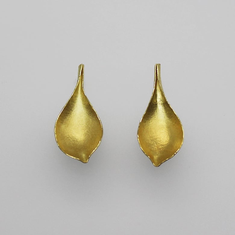 Image of long drop gold earrings