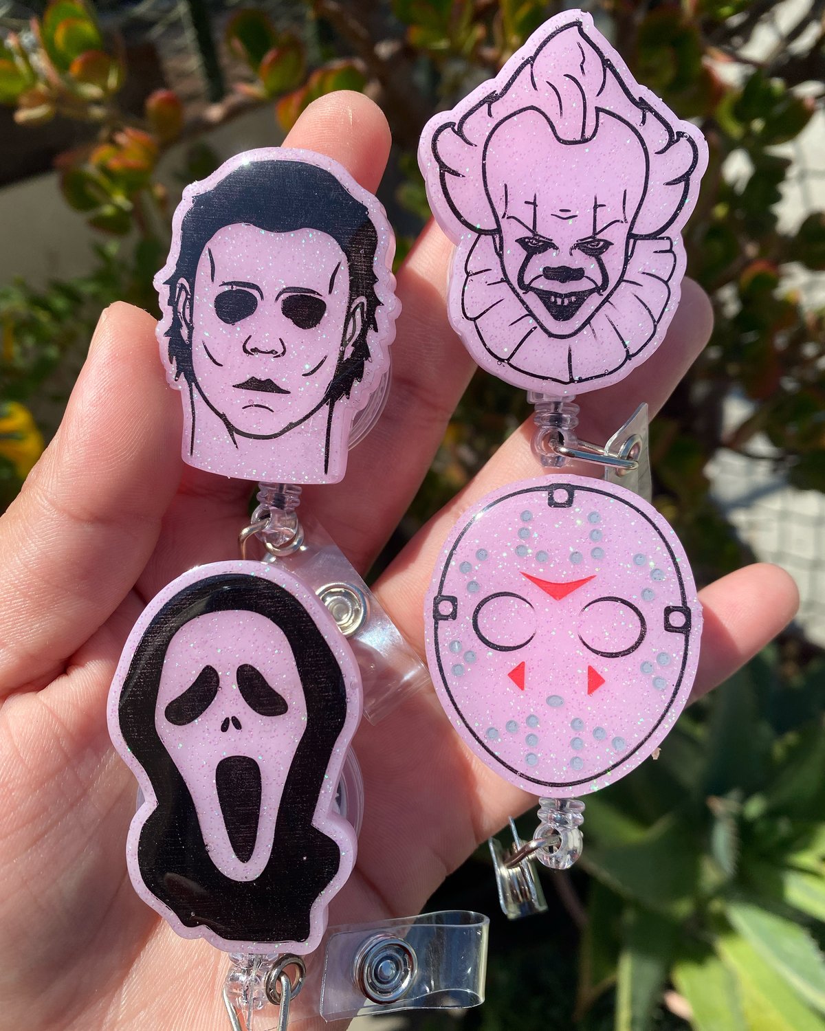 Image of Horror Dudes Pastel Pink Resin Badge Reel - Pick Your Fave! 