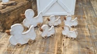 Image 1 of Wooden ducks family white