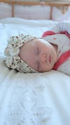Turban Iida motif Kukka
