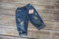 Distressed Denim Jeans