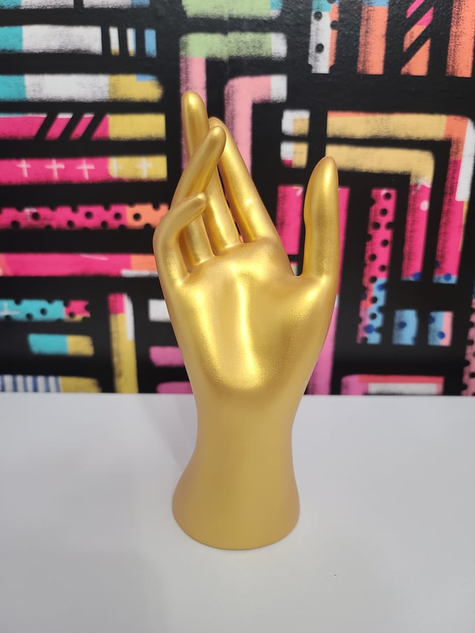 Image of Gold Hand Display