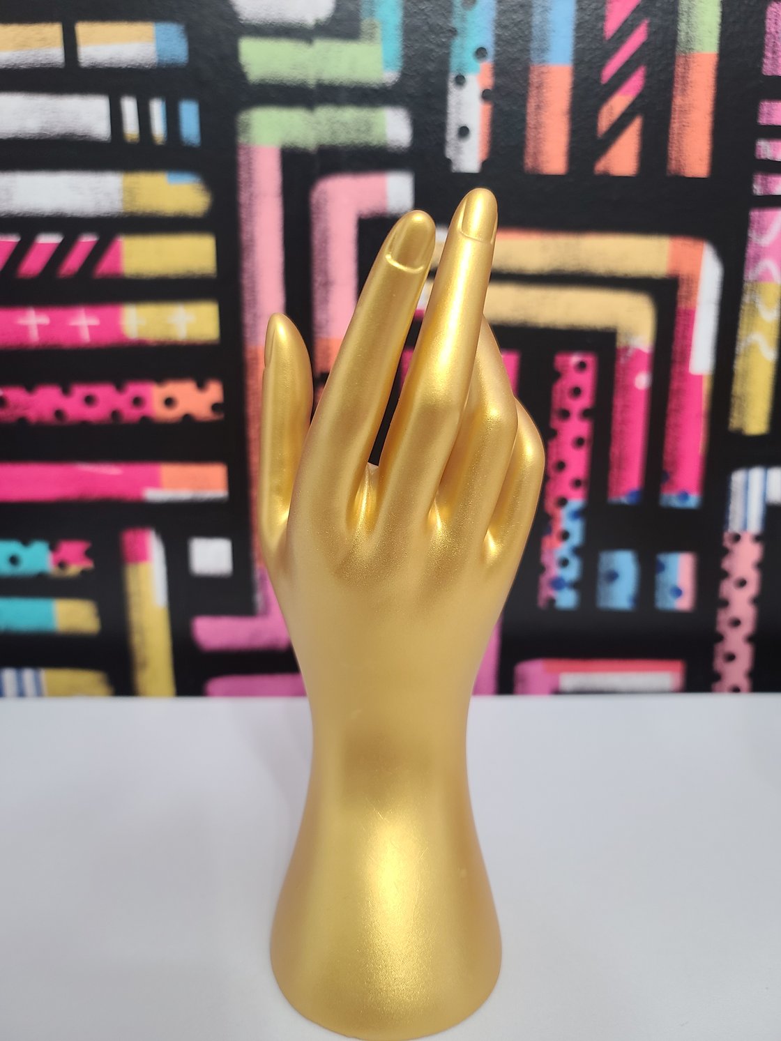 Image of Gold Hand Display