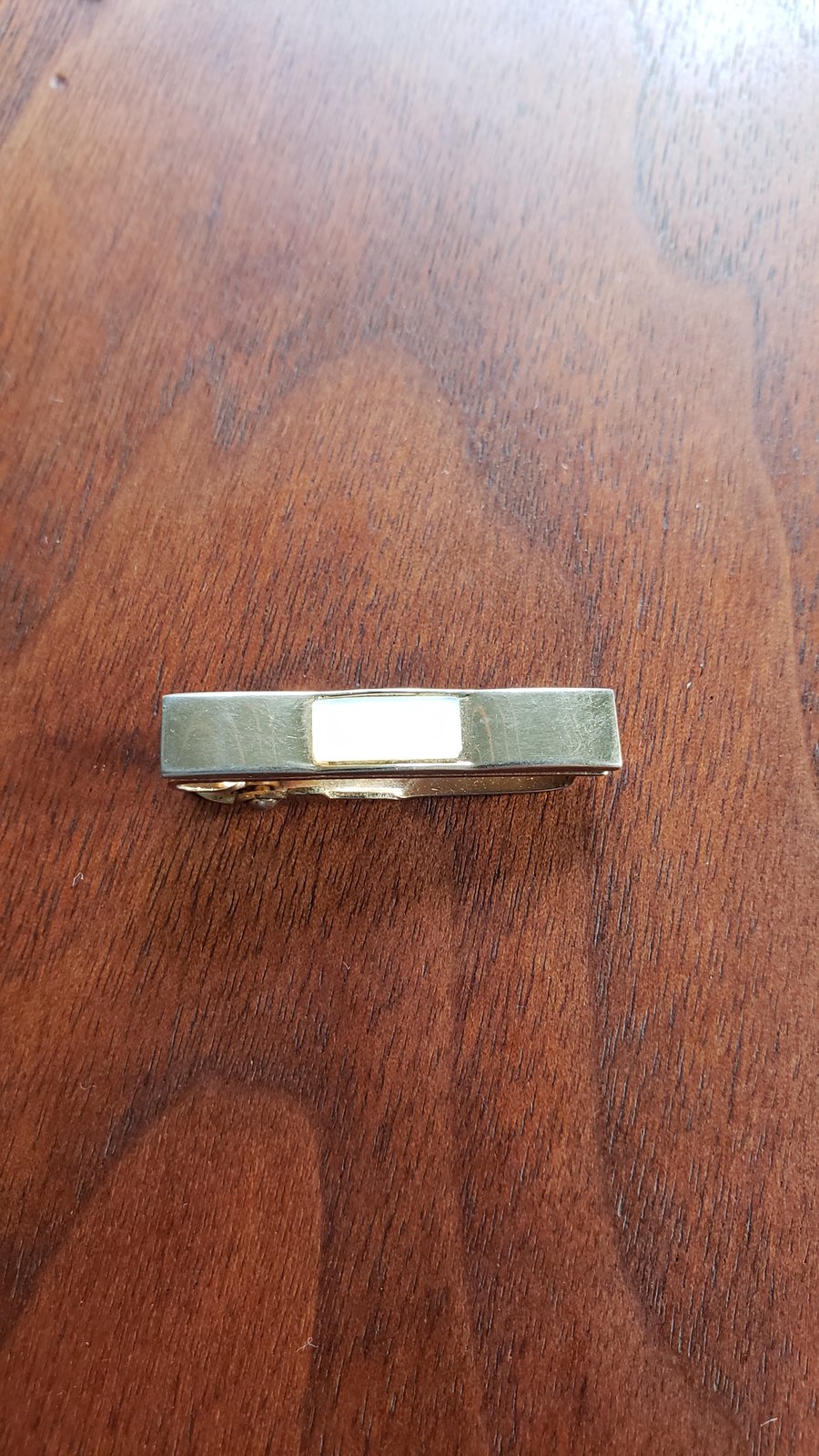Image of Vintage gold tone tie clip with Mother of Pearl inset by Swank
