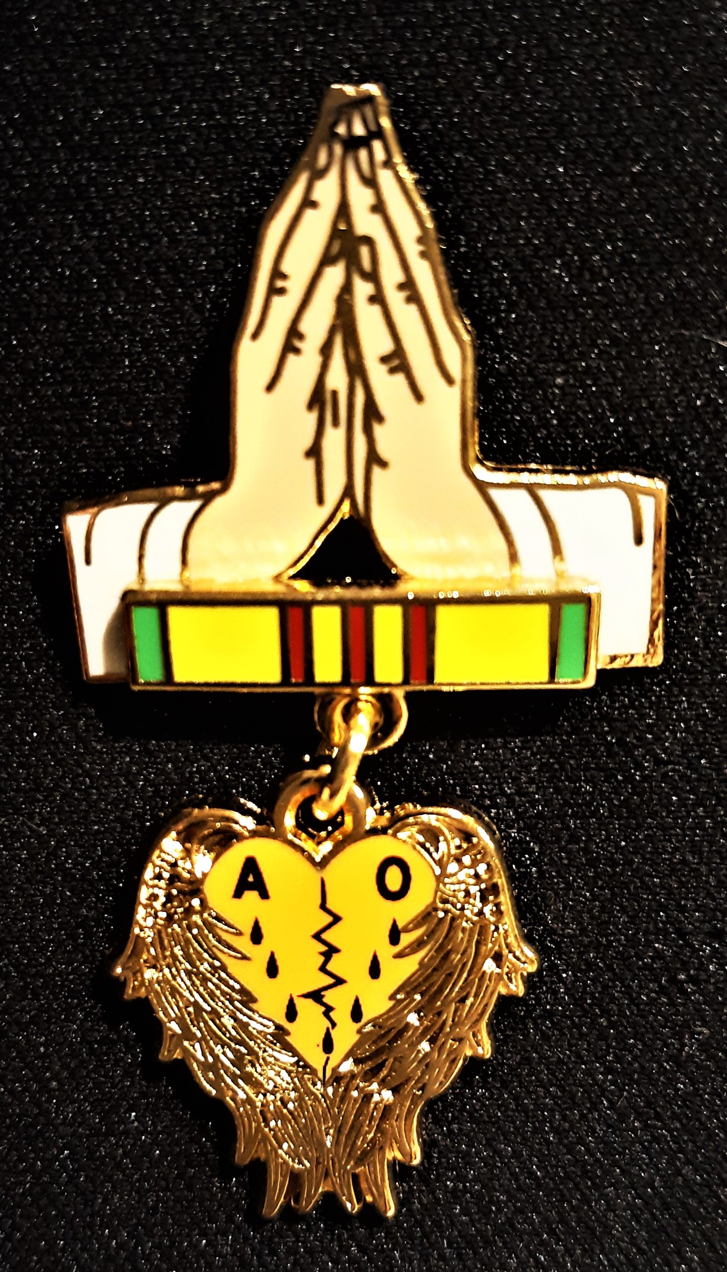 Image of Agent Orange Angel Heart Praying Hands Pin