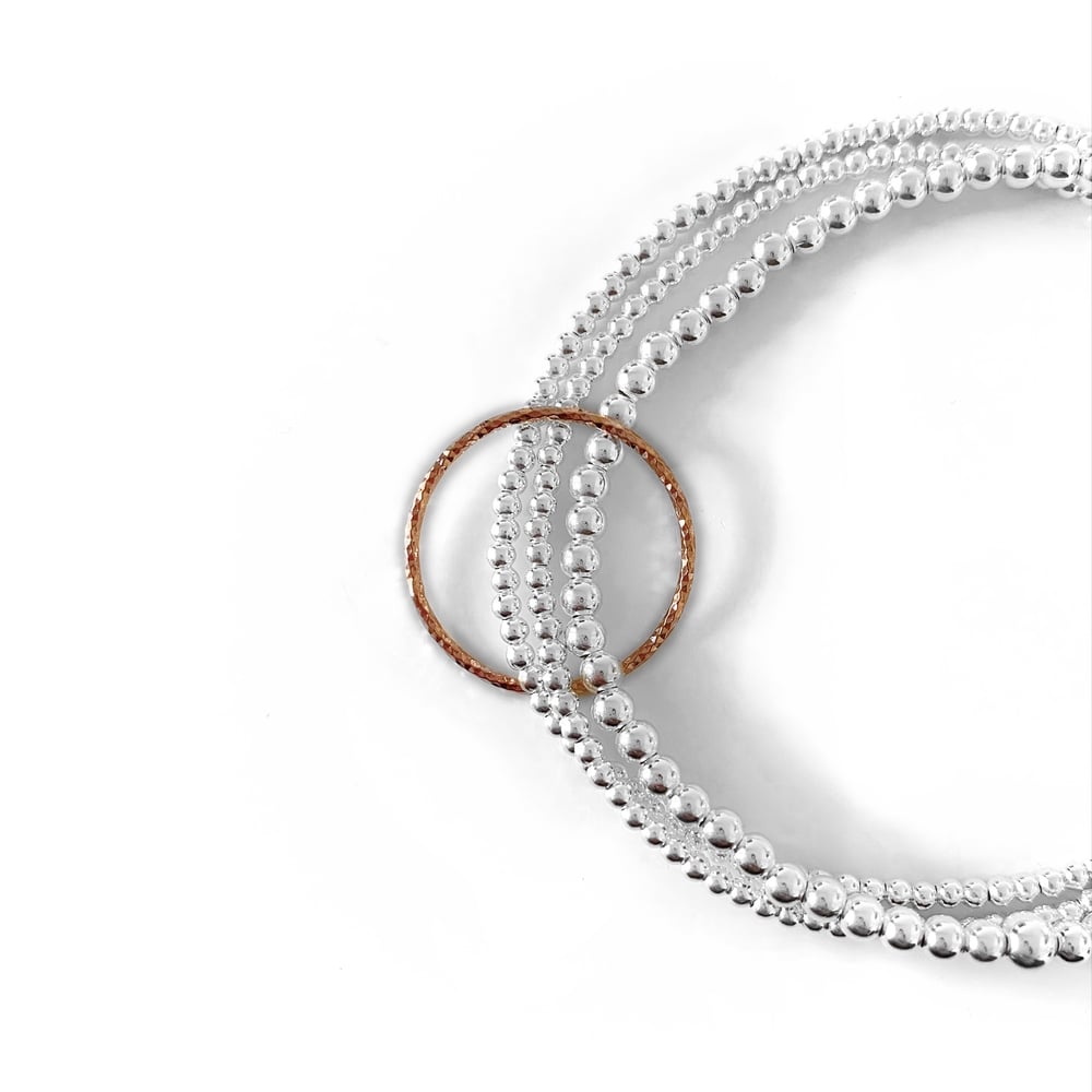 Image of Sterling Silver & Rose Gold Circle Triple Connector Bracelet 