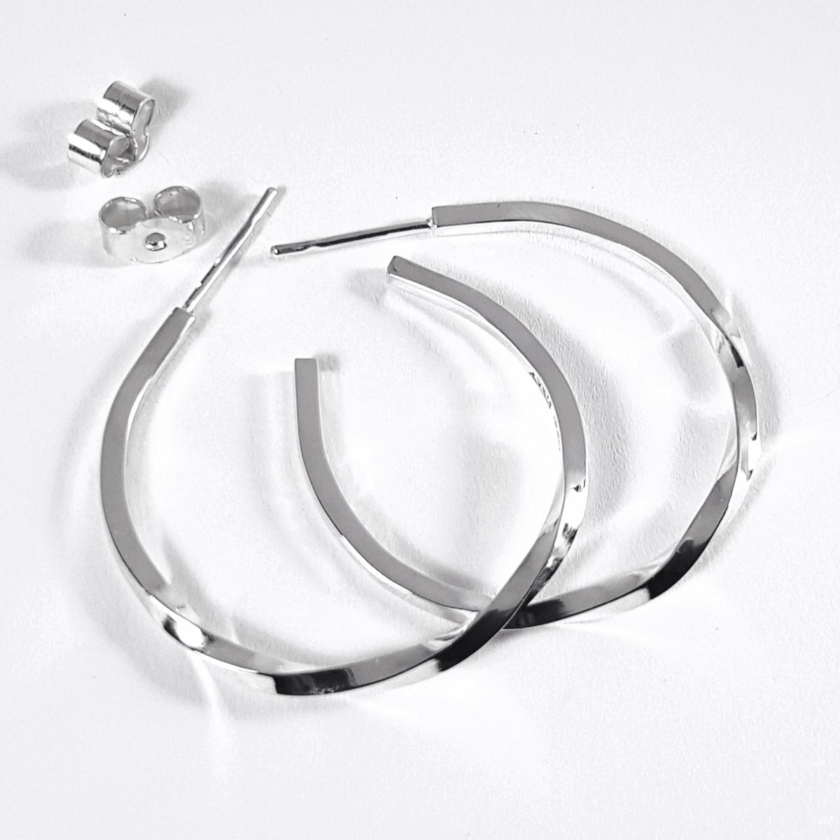 Image of Sterling Silver Hoop Earrings - Handmade Silver Hoop Earrings with a Twist 