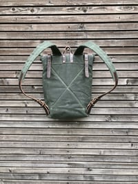 Image 3 of Backpack in waxed canvas with waxed leather front pocket and roll to close top