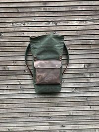 Image 4 of Backpack in waxed canvas with waxed leather front pocket and roll to close top