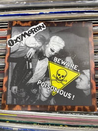Oxymoron-Beware Poisonous! 7”