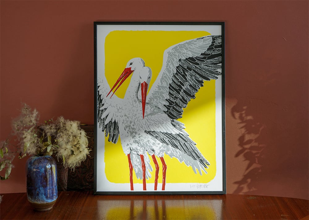 Image of Two storks (yellow)