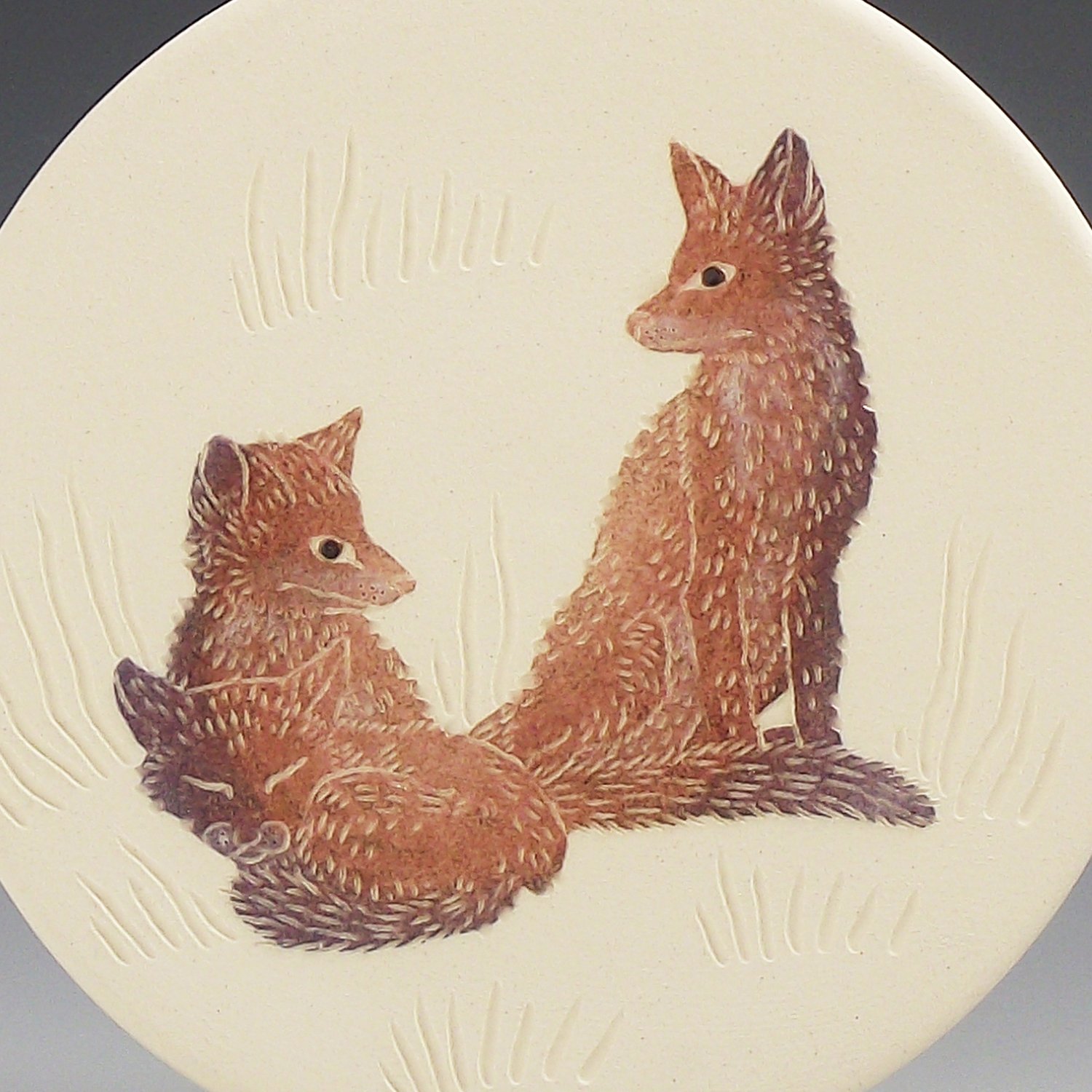 Image of Fox family ceramic wall hanging