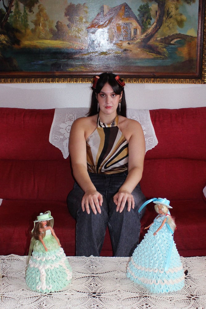 Image of Top Carmela Solano.