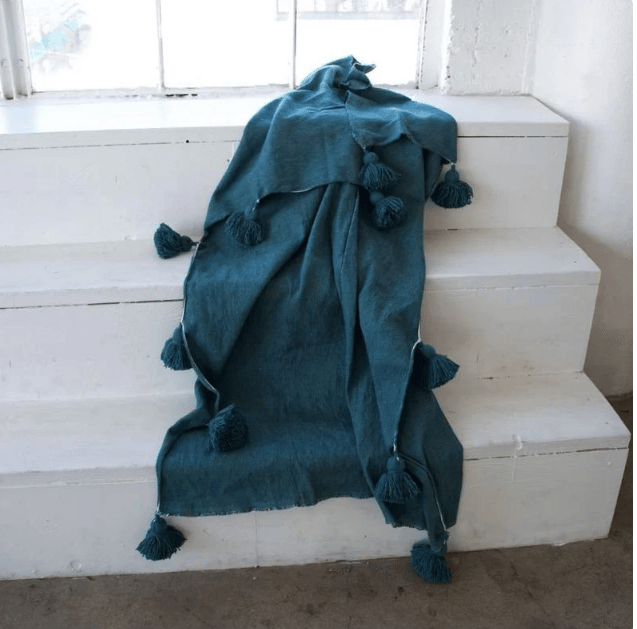Image of MOROCCAN POMPOM BLANKET - BLUE