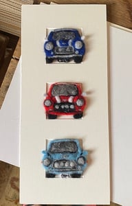 Image of "Three in a Box Mini Coopers"