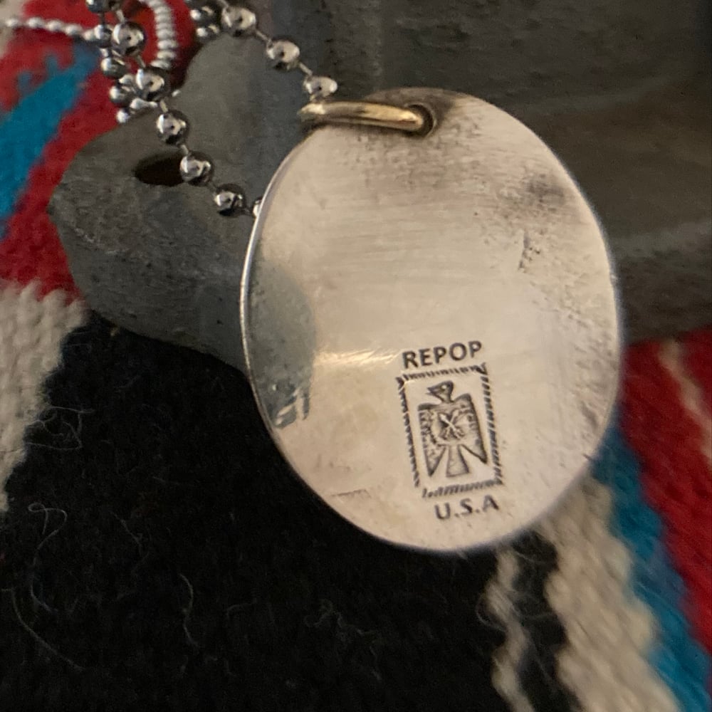 SKULL AND CROSSBONES PENDANT