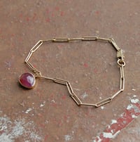 Image 1 of Gold link bracelet with pink sapphire