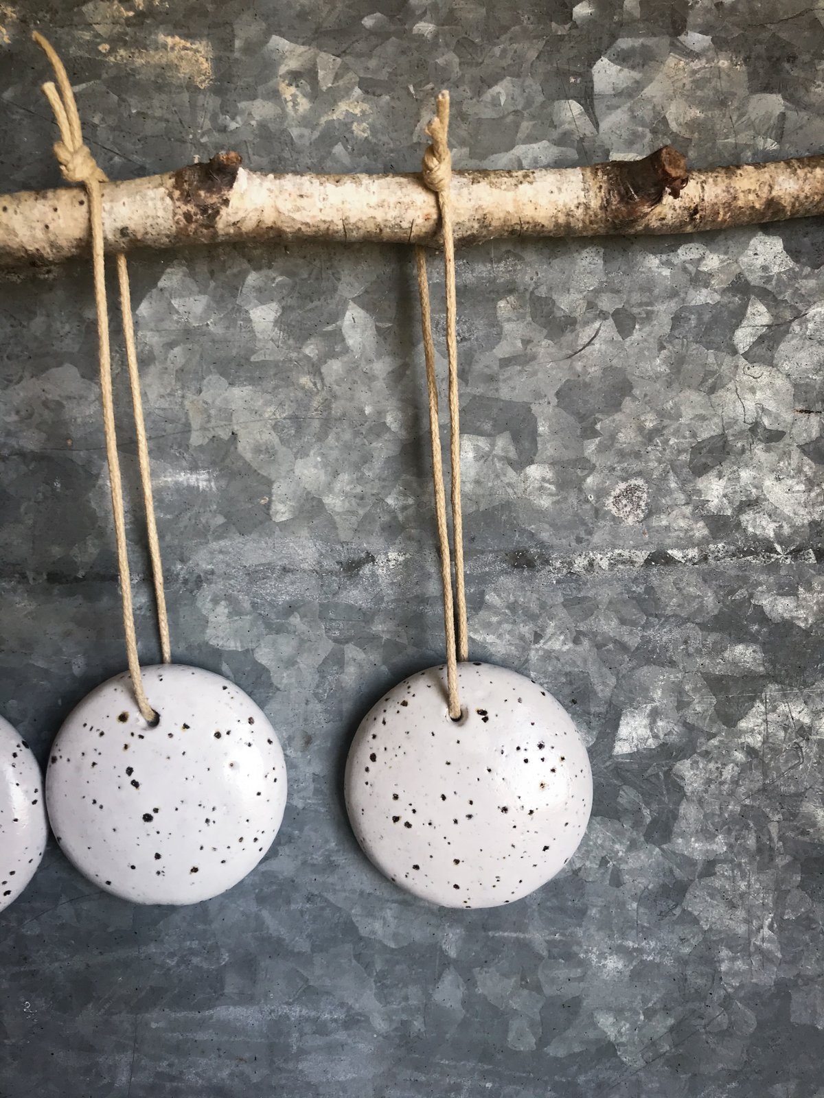 Image of Speckled white round stoneware Christmas ornaments