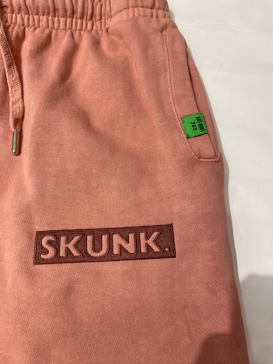 Image of Skunk. Box logo jogger (salmon)