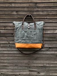 Image 4 of Waxed canvas roll top tote bag with luggage handle attachment leather handles and shoul