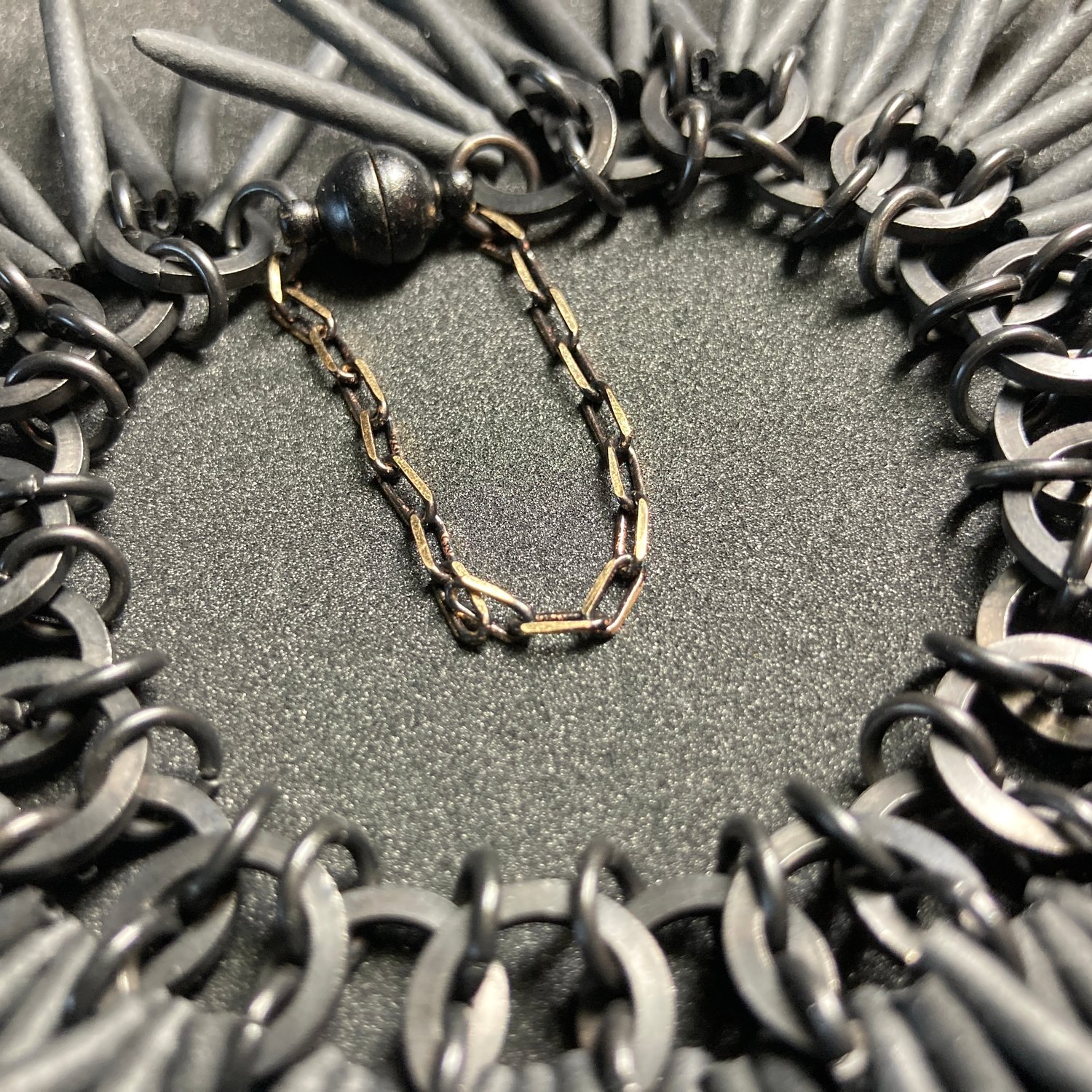 Image of Black Urchin Bracelet - Black on Black with faceted, brass safety chain
