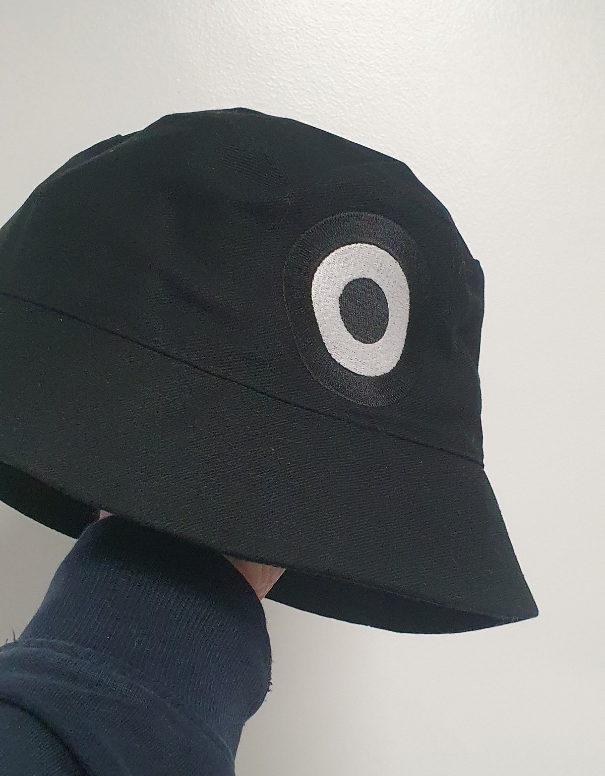 Black Bucket Hat With embroidered Black and white MOD logo. Size Medium.