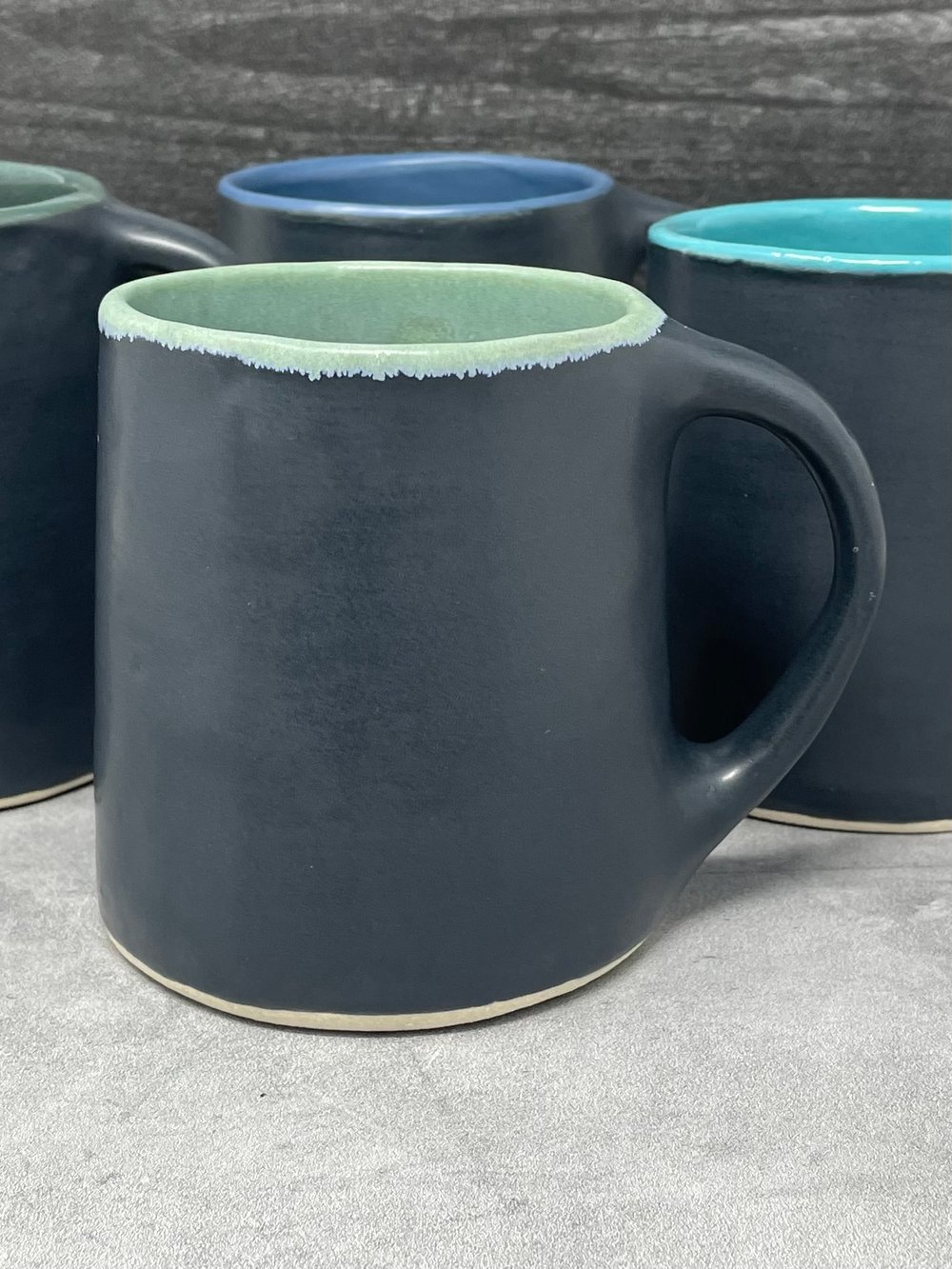 Image of Charcoal and Matte Green Mug AVAILABLE AT SALTSTONE CERAMICS