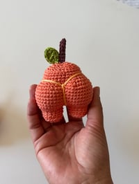 Image 2 of peach booty keychain