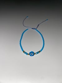 Image 1 of Blue flower evil eye bracelet 