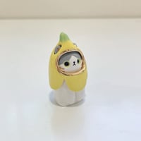 Image 3 of White and gray banana kitty ceramic figurine