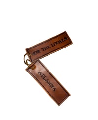 Image 1 of “4OR The Locals” and “Atlanna” Leather Keychains