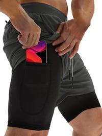 Pantalones cortos con licra color gris
