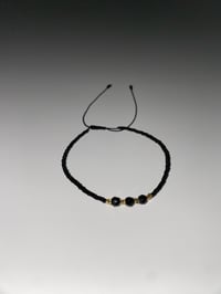 Image 1 of Black/gold bracelet 