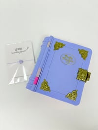 Image 3 of Ensemble bracelet et Polly Pocket Livre violet monde sous-marin.