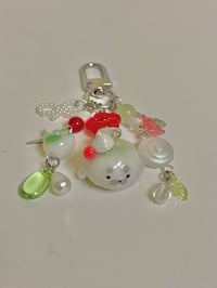 Image 2 of melon soda seal clay keychain