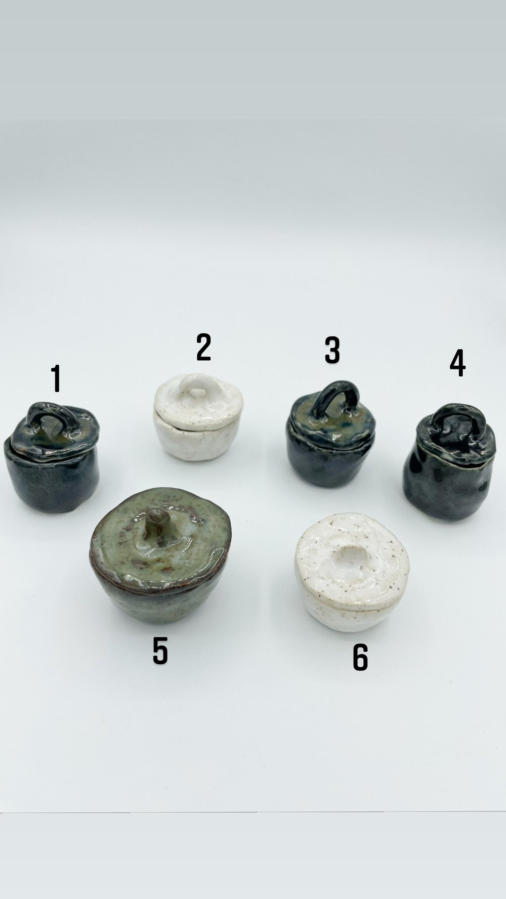 Image of Goblin Pots With Lids 