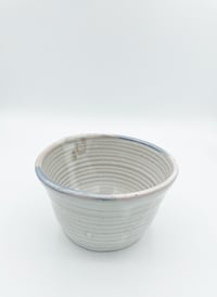 Image 1 of White Bowl with pink and blue rim 