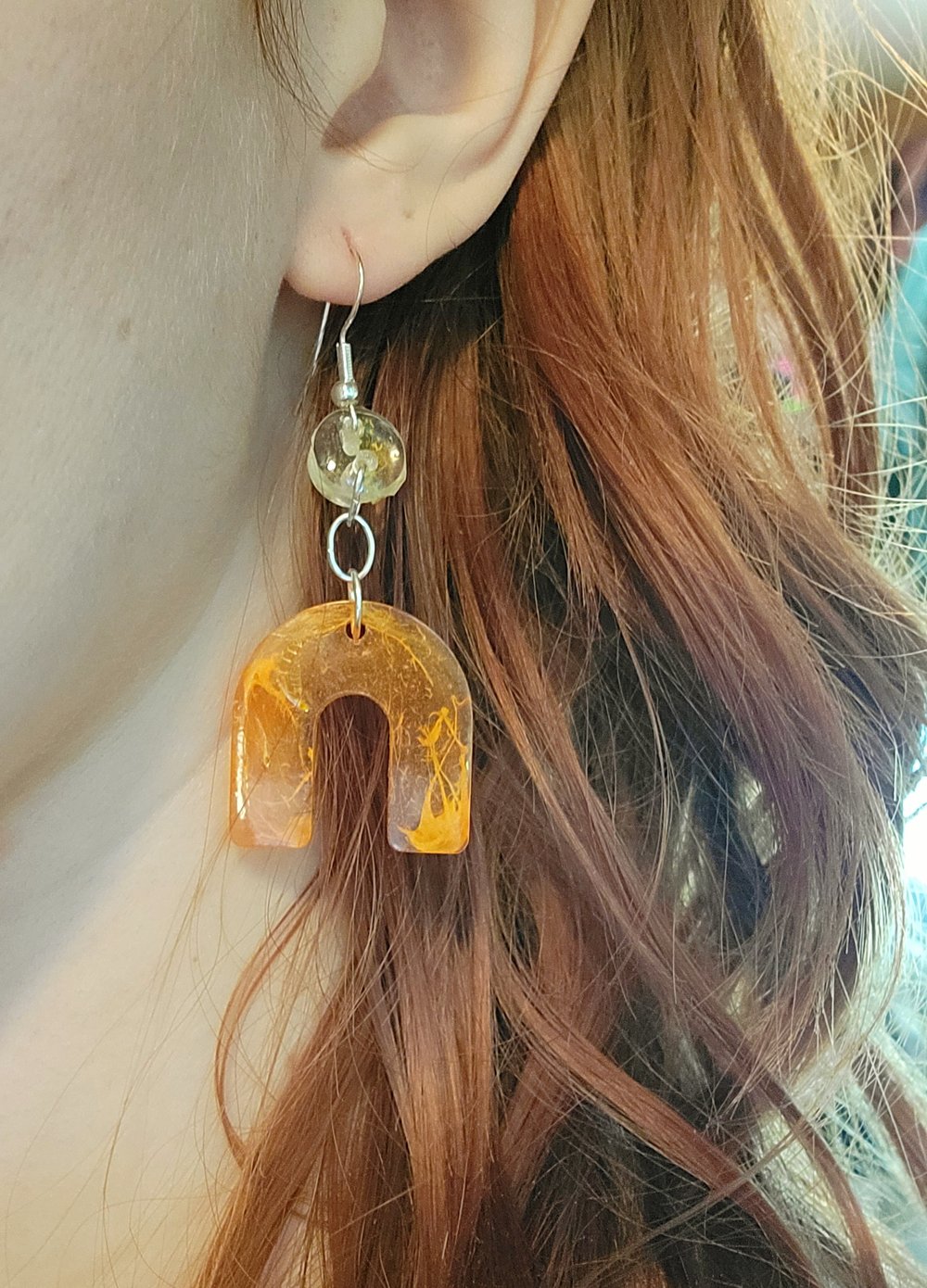 Image of Orange rainbow resin earrings