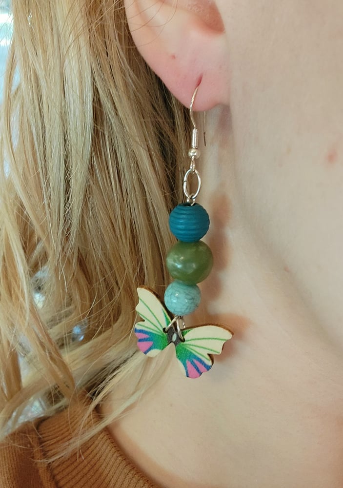 Image of Baby blue butterfly earrings 