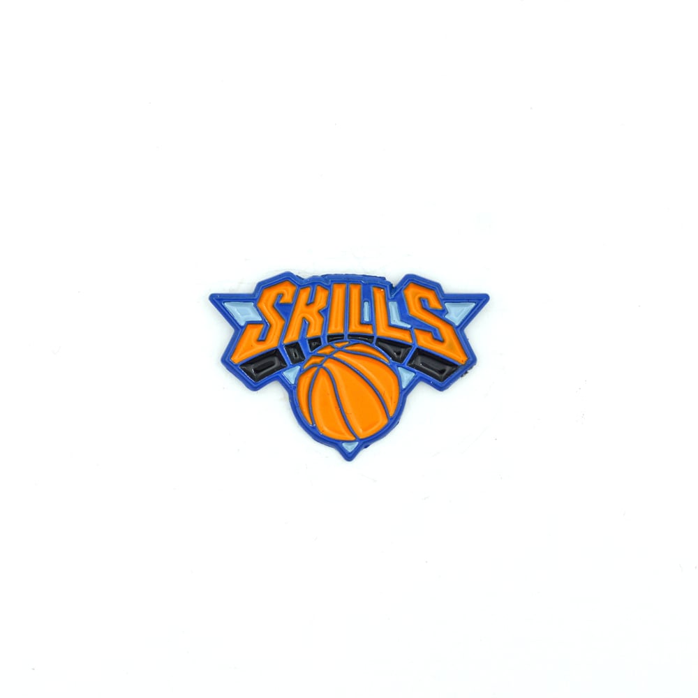 SKILLS enamel pin