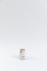 Image 1 of Glossy White Toasty Beak Baby Bird Creamer