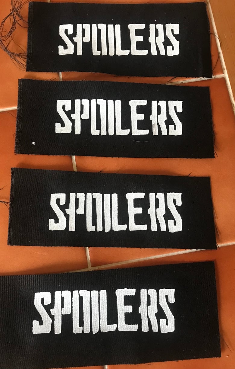 Image of Spoilers - Patch