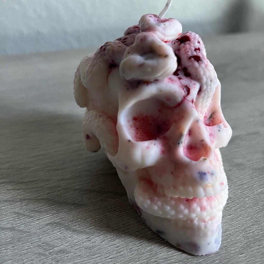 Raspberry lavender snake skull candle
